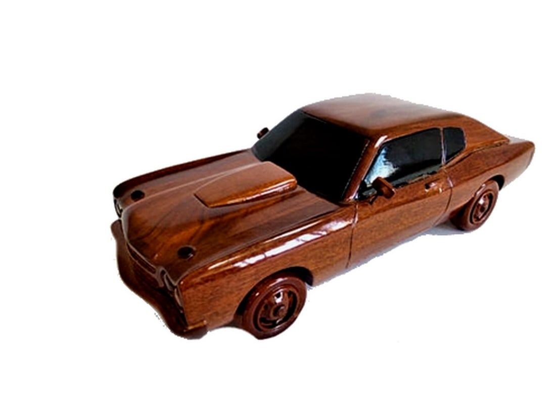 1970 Chevrolet Chevelle: 1970 Chevrolet Chevelle The 1970 Chevrolet Chevelle is beautifully recreated in this handcrafted scale model. Made of solid mahogany and finely detailed, this classic car in a clear polyurethane high