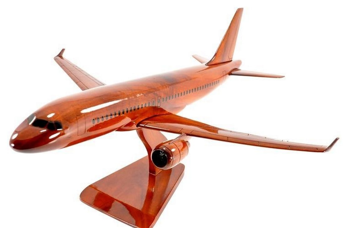 A-320 Airbus Wooden Model Replica: A-320 Airbus Wooden Model Replica The A-320 is expertly crafted from solid mahogany by skilled artisans. This jet features intricate detailing and a high gloss finish that highlights the beautiful