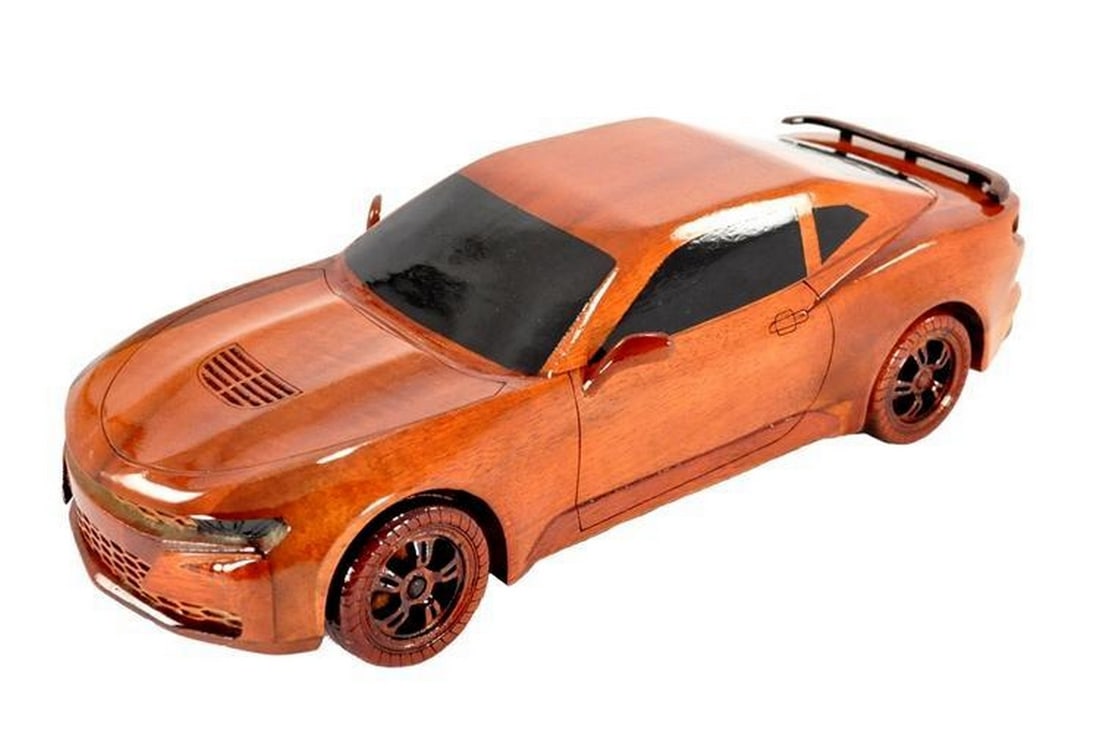 Chevrolet Camaro Model Car: Artisanally crafted from durable Mahogany, this meticulously detailed 1:14 scale replica of the 2018 Chevrolet Camaro is an ideal addition for aficionados of classic cars. Dimensions: 13" Long x