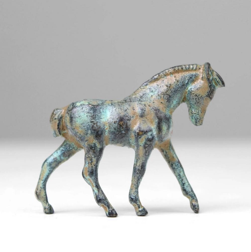 Aged Copper Foal Statuette: Aged Copper Foal Statuette This charming foal statuette captures the gentle spirit of a young horse in a compact, elegant form. Cast from copper-zinc alloy using a proprietary hot-casting process,