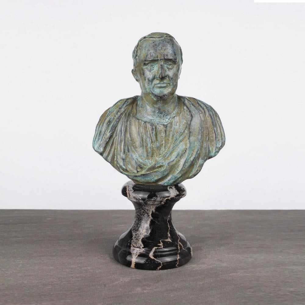 Cicero Bust Bronze Sculpture with Patinated Green Finish - (2.2lbs): Cicero Bust Bronze Sculpture with Patinated Green Finish - (2.2lbs) This elegant bust captures Marcus Tullius Cicero, Rome’s greatest orator and philosopher. Crafted from copper-zinc alloy with a