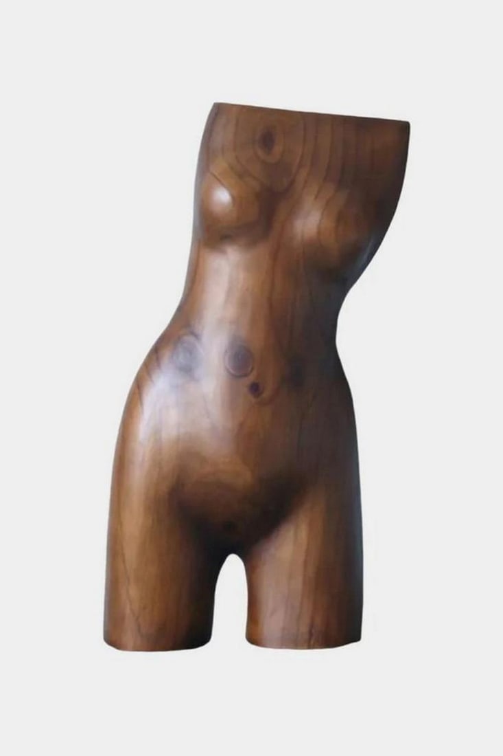 Hand-Carved Wooden Torso Sculpture: Hand-Carved Wooden Torso Sculpture This solid wood sculpture features a stylized female torso with no arms, legs, or head. Carefully carved from walnut, the piece shows smooth contours and a clean mat