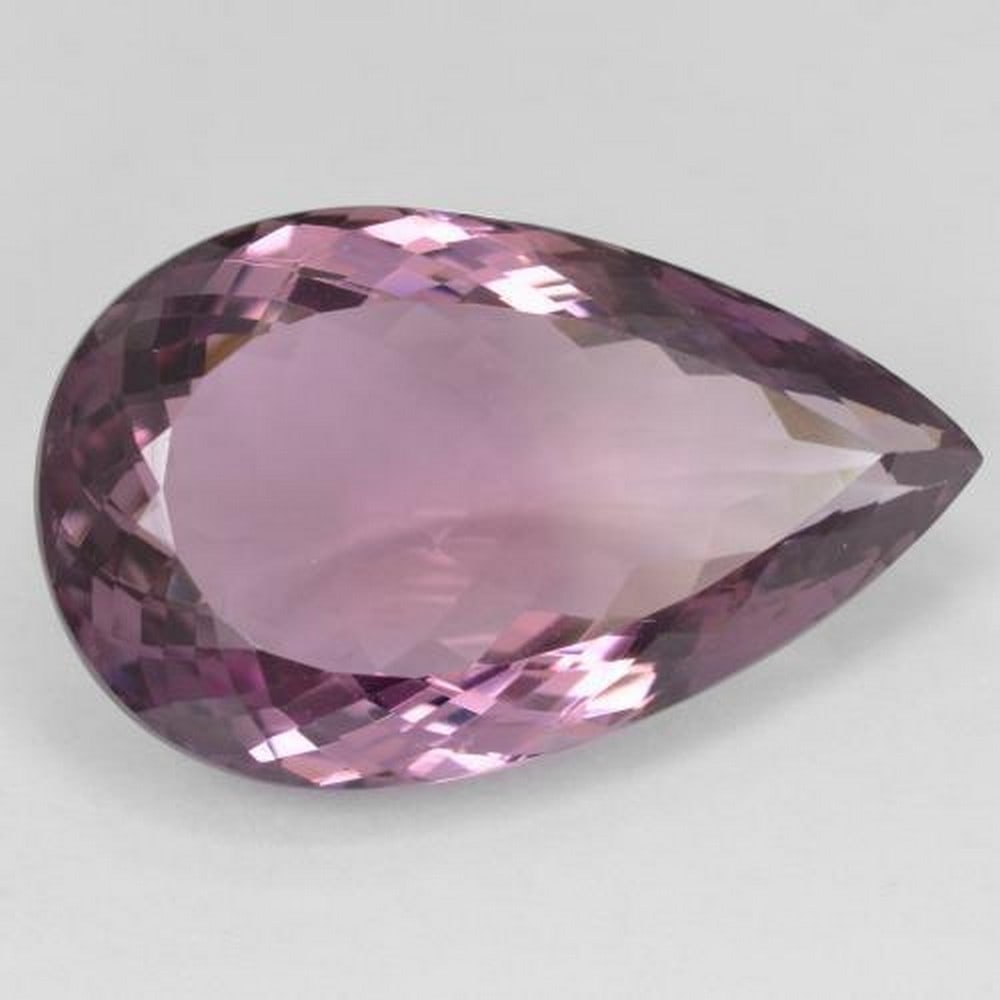 Gorgeous bi-color Pear Ametrine Gemstone: Gorgeous bi-color Pear Ametrine Gemstone This natural pear facet bi-color Ametrine in the exact size of 26.35 x 16.01 x 9.31 mm. The gemstone was mined in Brazil and has a finished weight of 22.5ct.