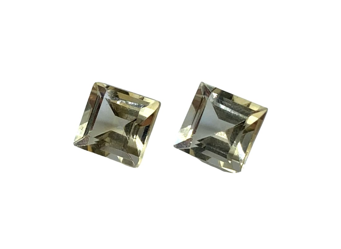 6.1 X 6.1mm Matching Square Sapphire Pair Gemstones: 6.1 X 6.1mm Matching Square Sapphire Pair Gemstones This is a set of 2 natural square light-gold Sapphires. Sapphires are most strongly linked to the Taurus zodiac sign and are used to symbolize