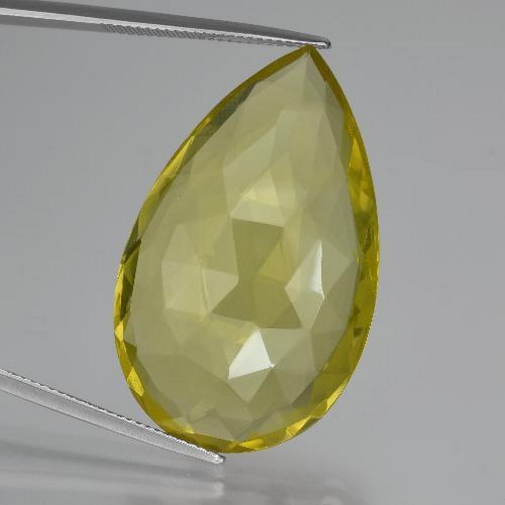 Pear Double-sided Checkerboard Yellow Quartz: Pear Double-sided Checkerboard Yellow Quartz Yellow Quartz is very much a positive energy stone, bringing a warm energy like the sun to uplift, strengthen and revitalize. Yellow Quartz can bring