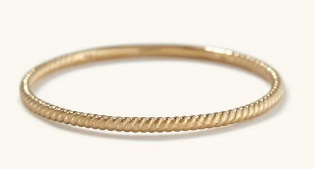 Gold Helix Ring: Gold Helix Ring Graceful and sculptural, the 14K Gold Helix Ring features a gently spiraled design that catches the light with every movement. Crafted in rich yellow gold, this ring brings a touch of