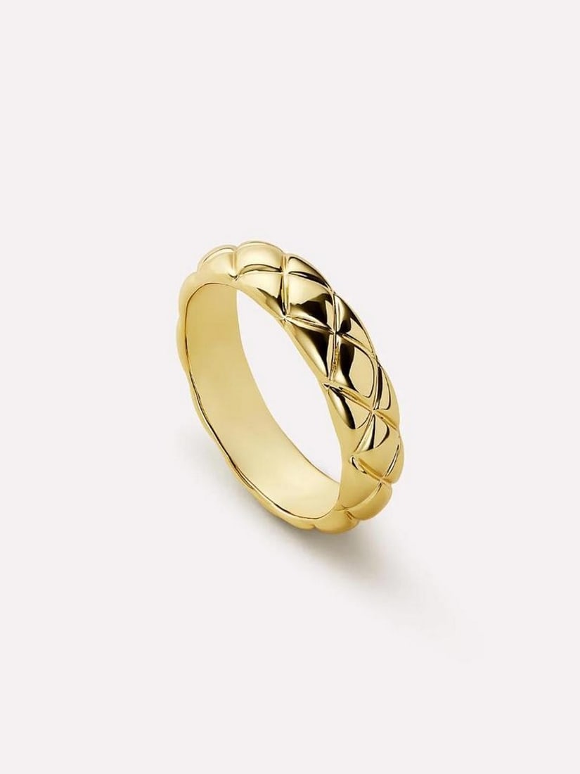 14K Gold-Dipped Quilted Band Ring: 14K Gold-Dipped Quilted Band Ring Plush, silky, and timelessly chic, this quilted ring features a beautiful quilted pattern that adds instant sophistication to any look. Dipped in 14K gold for a radi