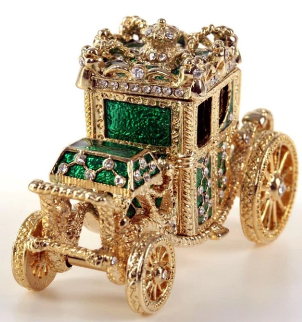 Enchanted Emerald Golden Carriage Trinket Box: Enchanted Emerald Golden Carriage Trinket Box Step into a realm of enchantment with our exquisite Enchanted Emerald Golden Carriage Trinket Box, plated with 24K gold for a touch of luxury. Crafted