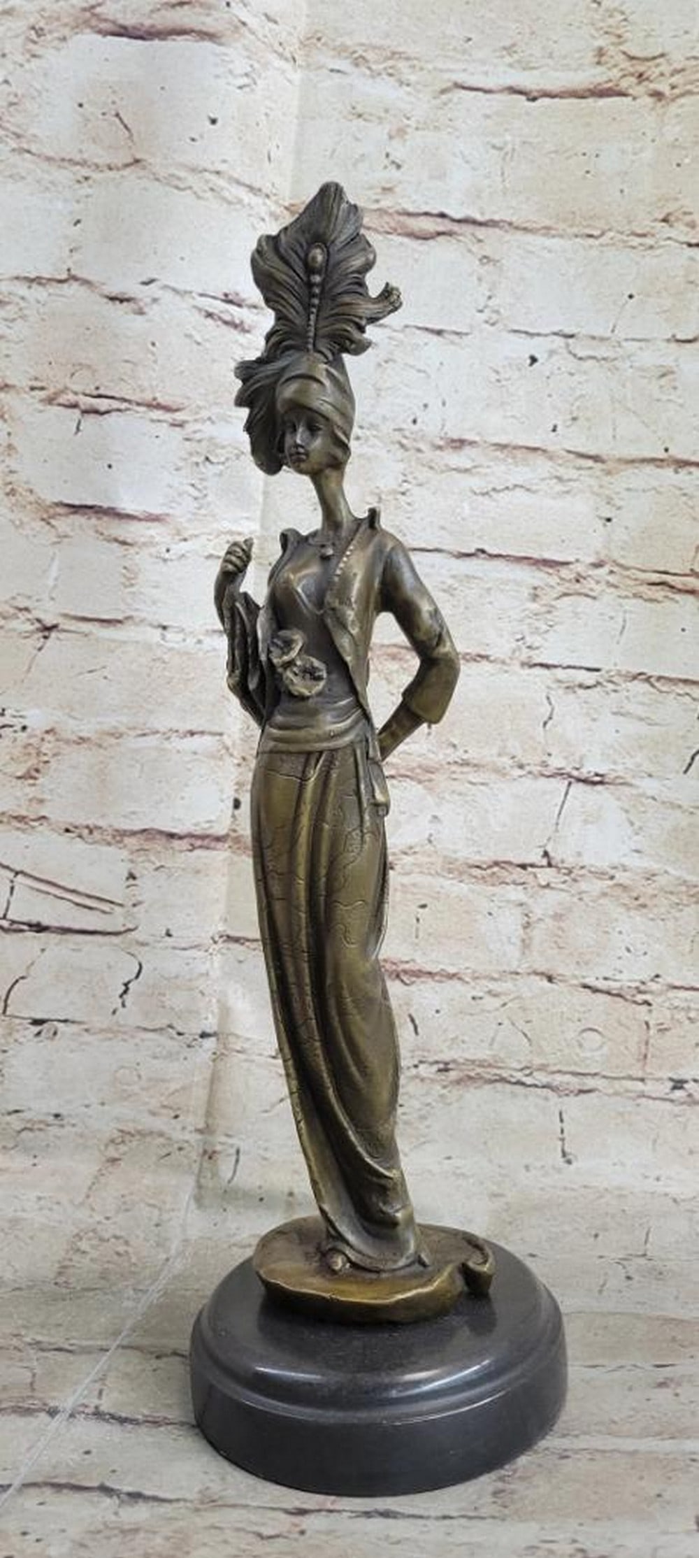 Original Signed Kassin Maiden Bronze Lady Sculpture Statue Figurine Art - 14.5" x 4.5": Original Signed Kassin Maiden Bronze Lady Sculpture Statue Figurine Art - 14.5" x 4.5" This bronze sculpture captures the glamour of the 1920s, depicting a poised maiden holding four feathers.