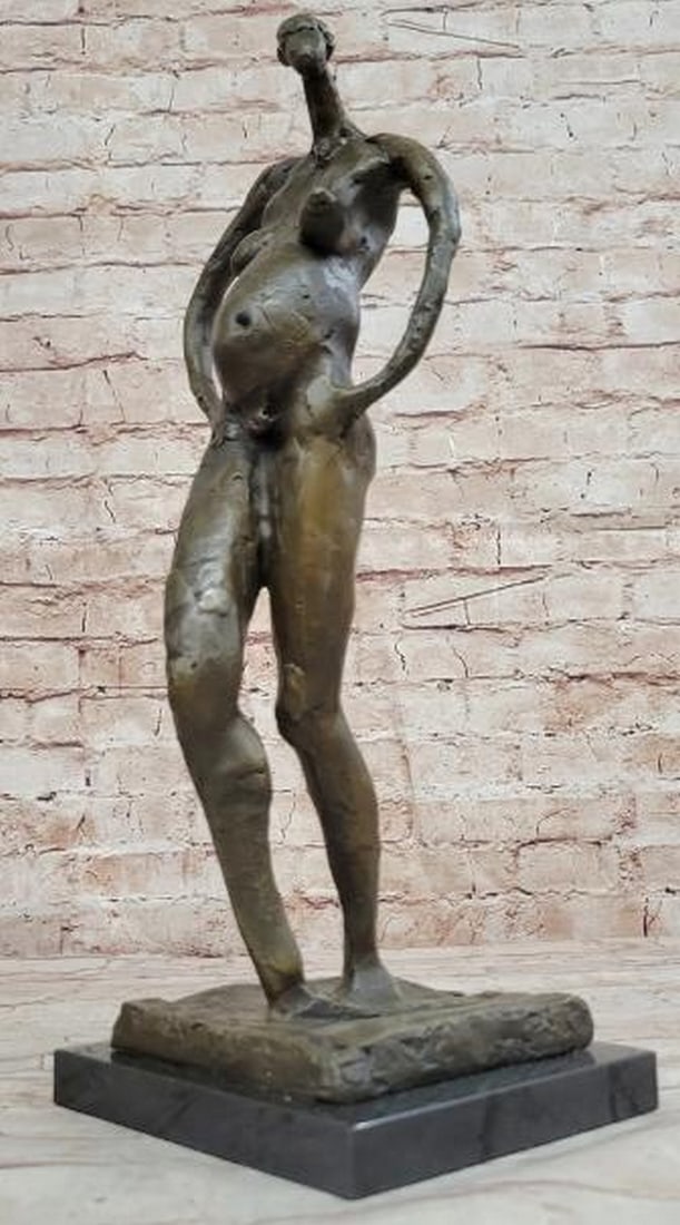 Fertile Dream: Surreal Pregnant Female Bronze Sculpture Reproduction: Fertile Dream: Surreal Pregnant Female Bronze Sculpture Reproduction A haunting and symbolic reproduction bronze sculpture inspired by the surrealist imagination of Salvador Dalí, this abstract fema