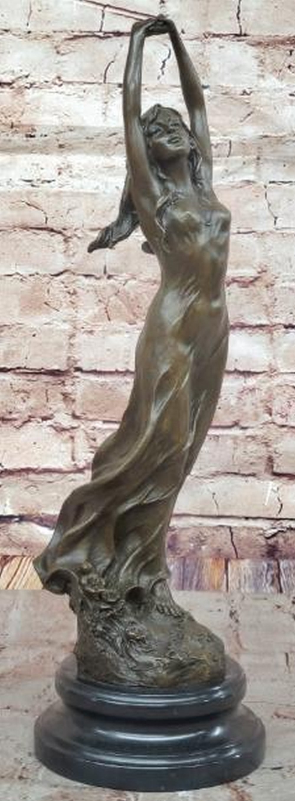 Morning Grace Stretching Woman Bronze Sculpture: Morning Grace Stretching Woman Bronze Sculpture Elegance in motion, this sculpture captures a serene and sensual moment in bronze. This evocative sculpture features a woman stretching, her form elong