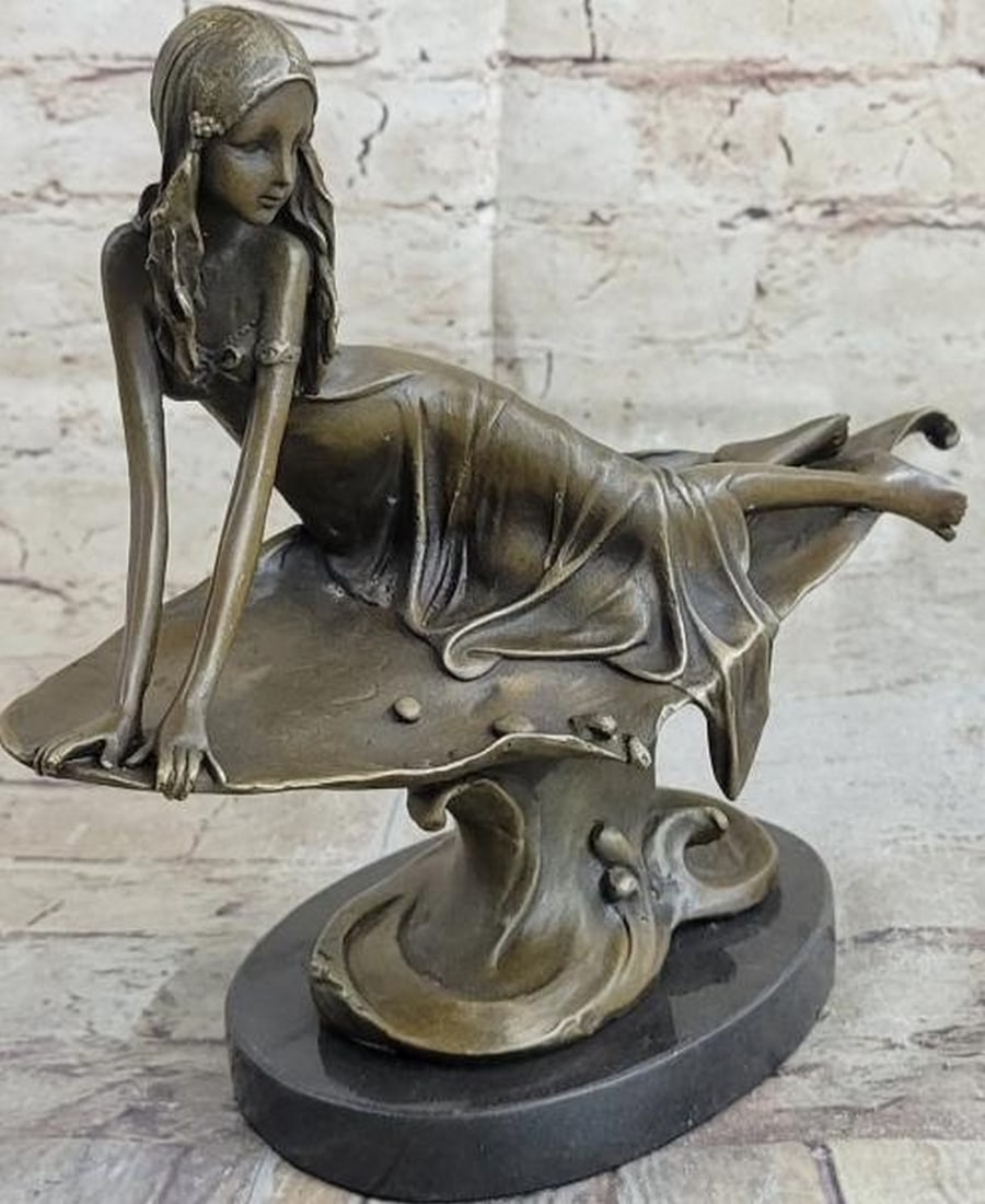 Quiet Reflection Lounging Girl Bronze Sculpture: Quiet Reflection Lounging Girl Bronze Sculpture Capturing a tender moment of stillness, this is a beautifully crafted bronze sculpture of a young girl lounging gracefully on her side, set upon a poli
