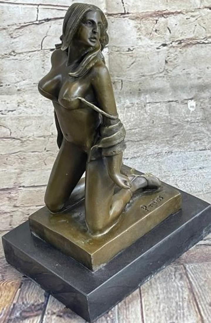 Semi-Nude Bronze Female Reproduction Sculpture: Semi-Nude Bronze Female Reproduction Sculpture Exuding quiet sensuality and poised elegance, this bronze sculpture features a semi-nude female figure gracefully posed on her knees. Her posture, both