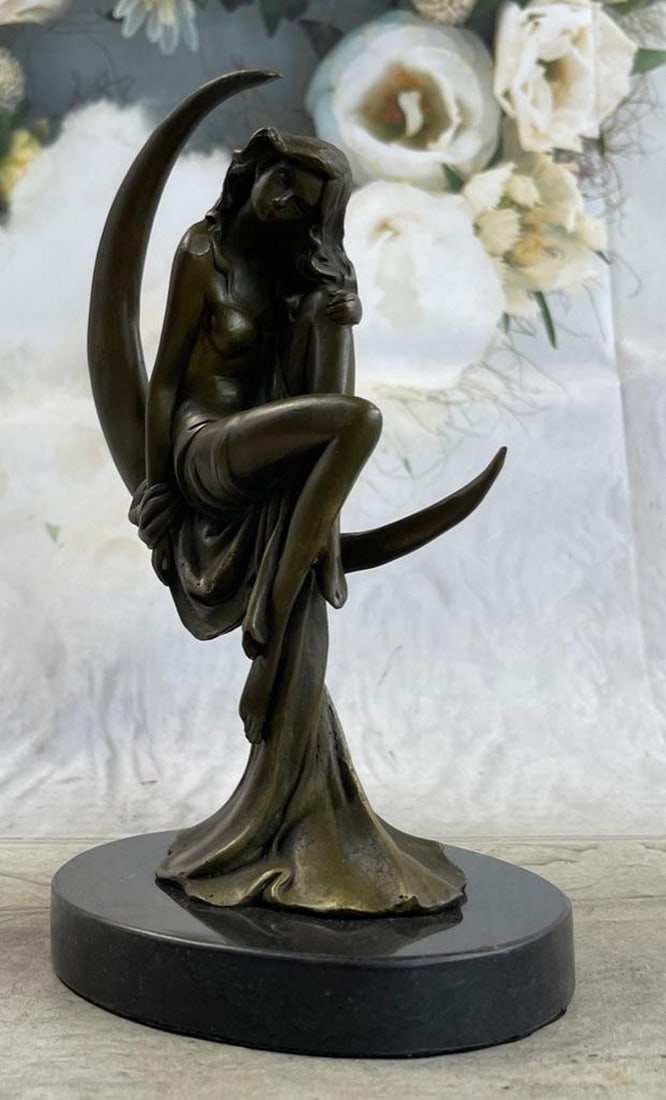 High Life Girl on Crescent Moon Bronze Statue: High Life Girl on Crescent Moon Bronze Statue The 100% bronze sensual woman sits upward, extending her arms in the air with her legs crossed. Her arms wrap around her head in a grasp of fervor. Her f