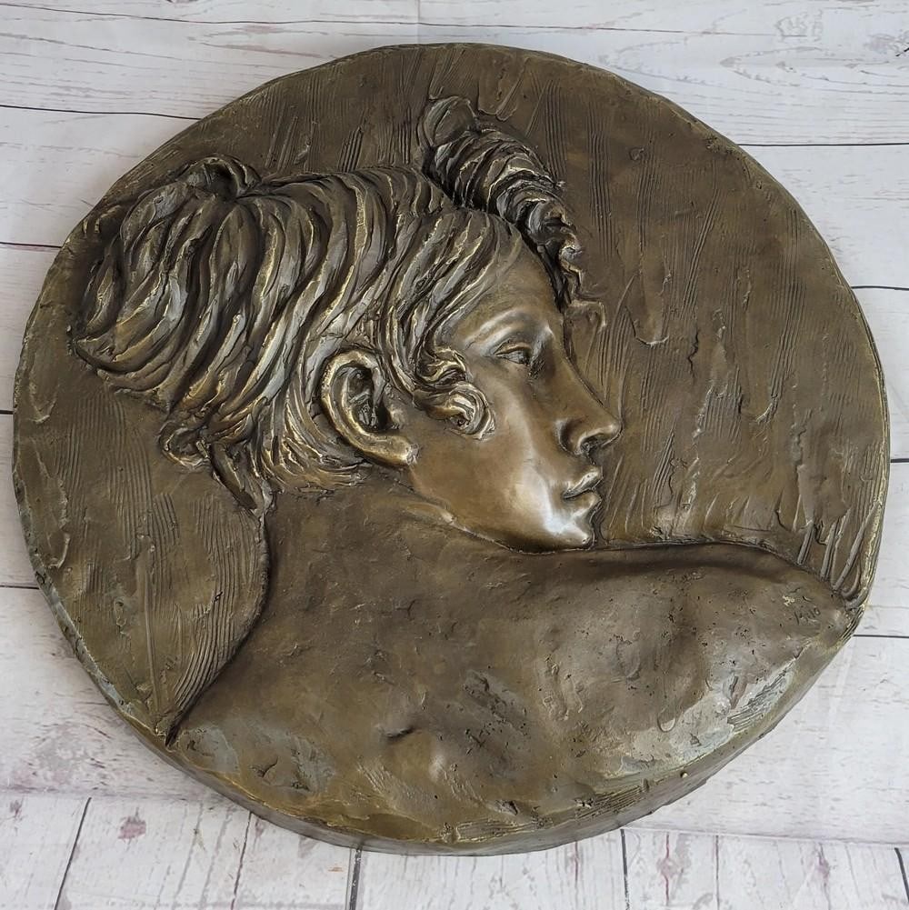 Art Nouveau Wall Hanging Bronze Plaque of a Woman's Profile - 17" x 17": Art Nouveau Wall Hanging Bronze Plaque of a Woman's Profile - 17" x 17" This beautiful wall piece depicts a the profile a young woman. Her expression is solemn. Freshly blossomed flowers
