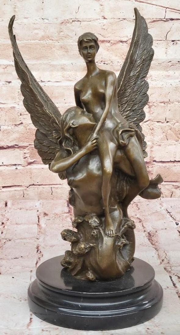 Romantic Bronze Angel Sculpture – 14" x 8": Romantic Bronze Angel Sculpture – 14" x 8" This bronze sculpture depicts two winged figures in an embrace, symbolizing comfort and support. Cast using the traditional lost wax method and fin