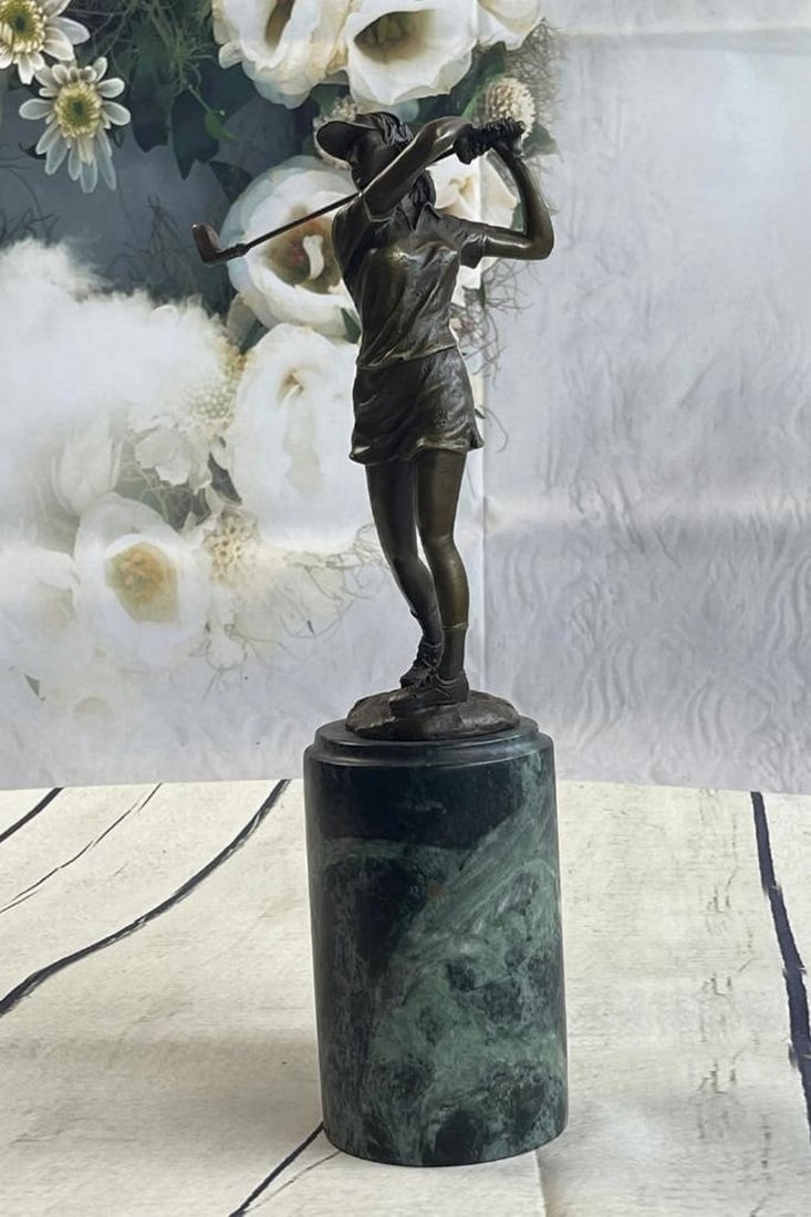 Signed Original Girl Golfer Bronze Sculpture On Marble Base - 13" x 3": Signed Original Girl Golfer Bronze Sculpture On Marble Base - 13" x 3" A golfer tilts her head up to the sun and watches her ball rise. She holds her form and stance, tracking the position of