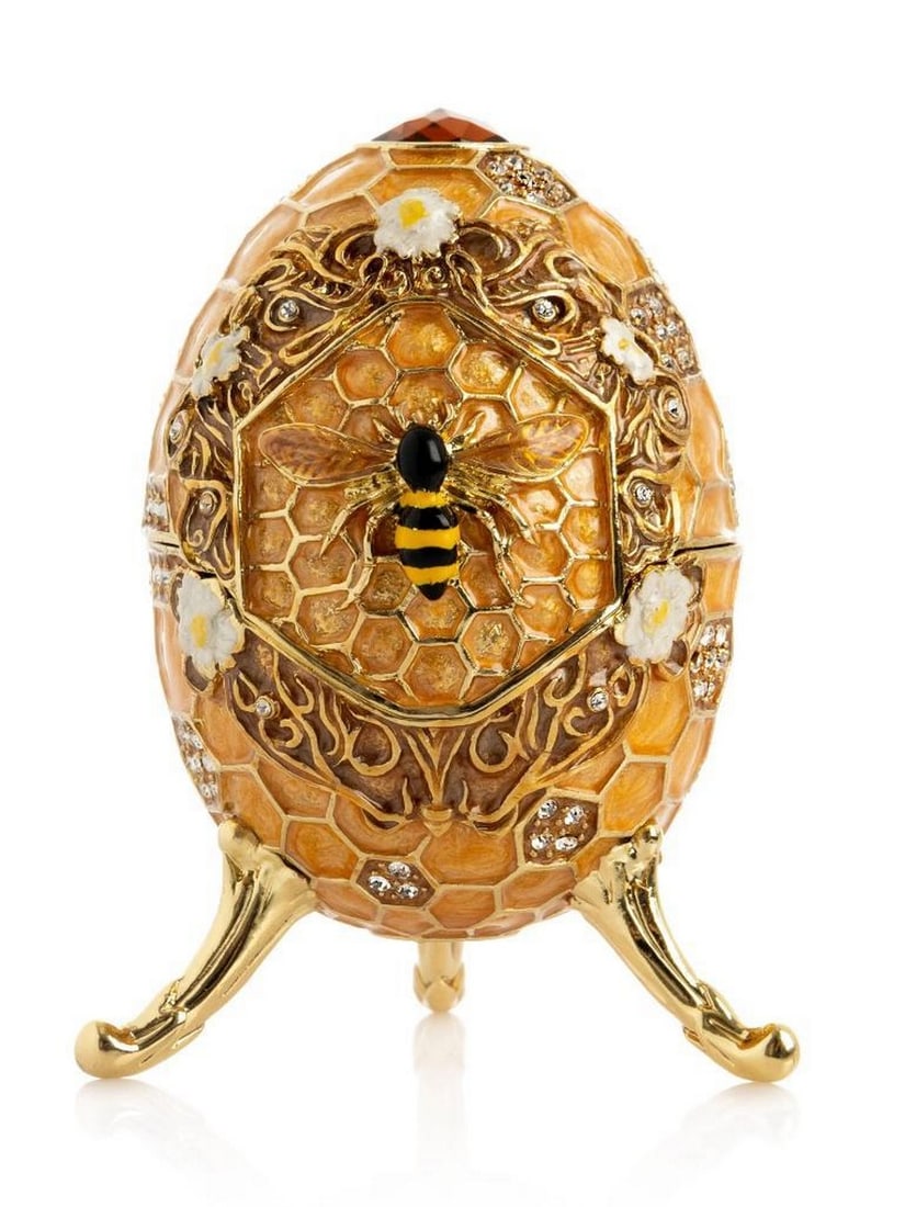 Honeycomb Bee Easter Egg Trinket Box 24K Gold Plated: Honeycomb Bee Easter Egg Trinket Box 24K Gold Plated This enamel-painted trinket box features a honeycomb egg design accented with a single bee and is handcrafted and plated with 24K gold. Austrian cr