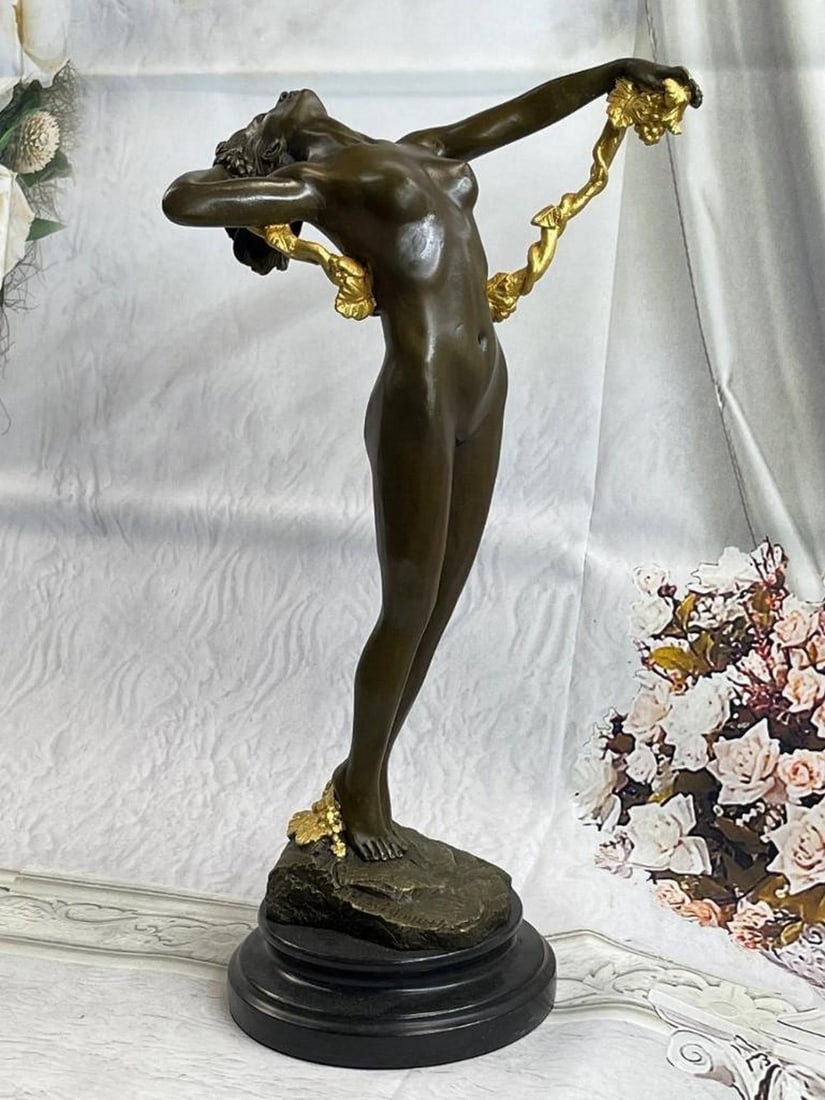Graceful Woman Entwined In Golden Vine Bronze Sculpture - 16" x 9": Graceful Woman Entwined In Golden Vine Bronze Sculpture - 16" x 9" The nude beauty leans far back to embrace the moment. Amidst the airs of the nature, she holds her roped hair in her left ha