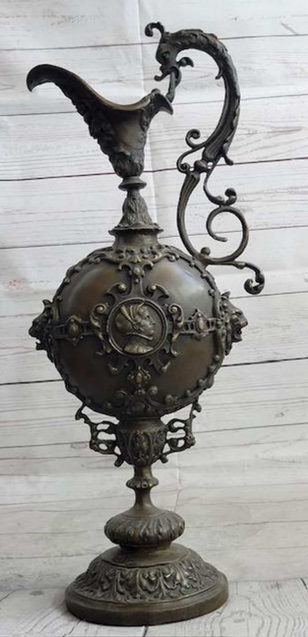 Bronze Royal Lion Griffin King Urn Statue Vase Fantasy Animal Sculpture Statue: Bronze Royal Lion Griffin King Urn Statue Vase Fantasy Animal Sculpture Statue Add a regal touch to your decor with this stunning decorative bronze piece. Modeled after a vase, it features an elegant