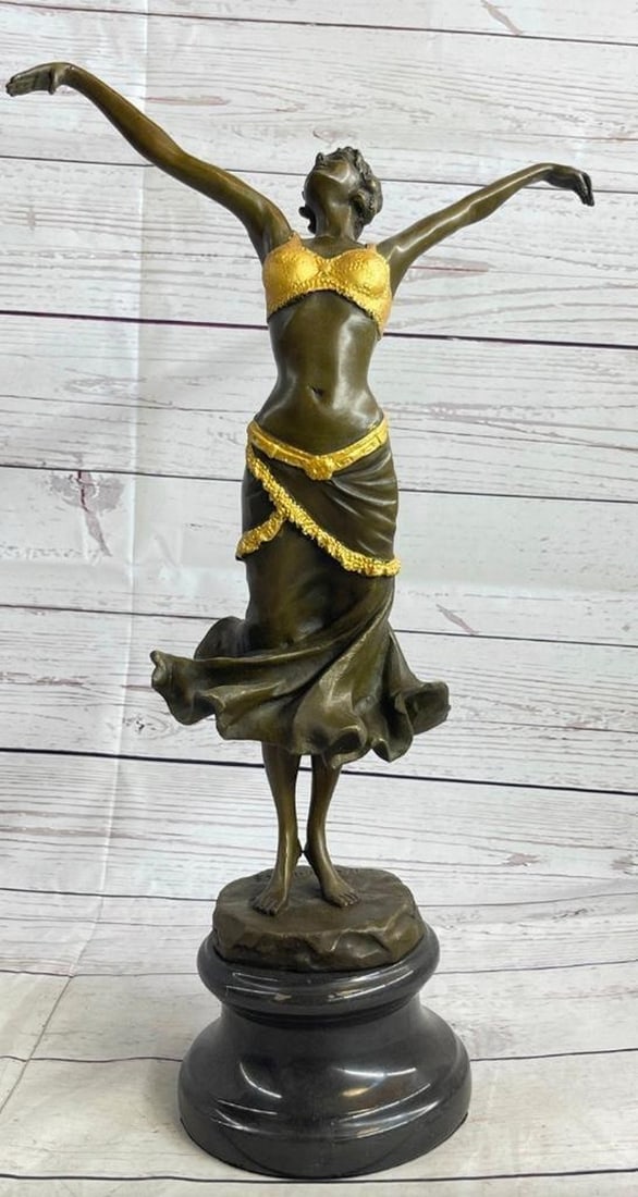 Russian Dancer Inspired Reproduction Bronze Sculpture: Russian Dancer Inspired Reproduction Bronze Sculpture This amazing number will leave you in a state of glory by its astonishing details and colors. She stands with her arms spread out over her head a