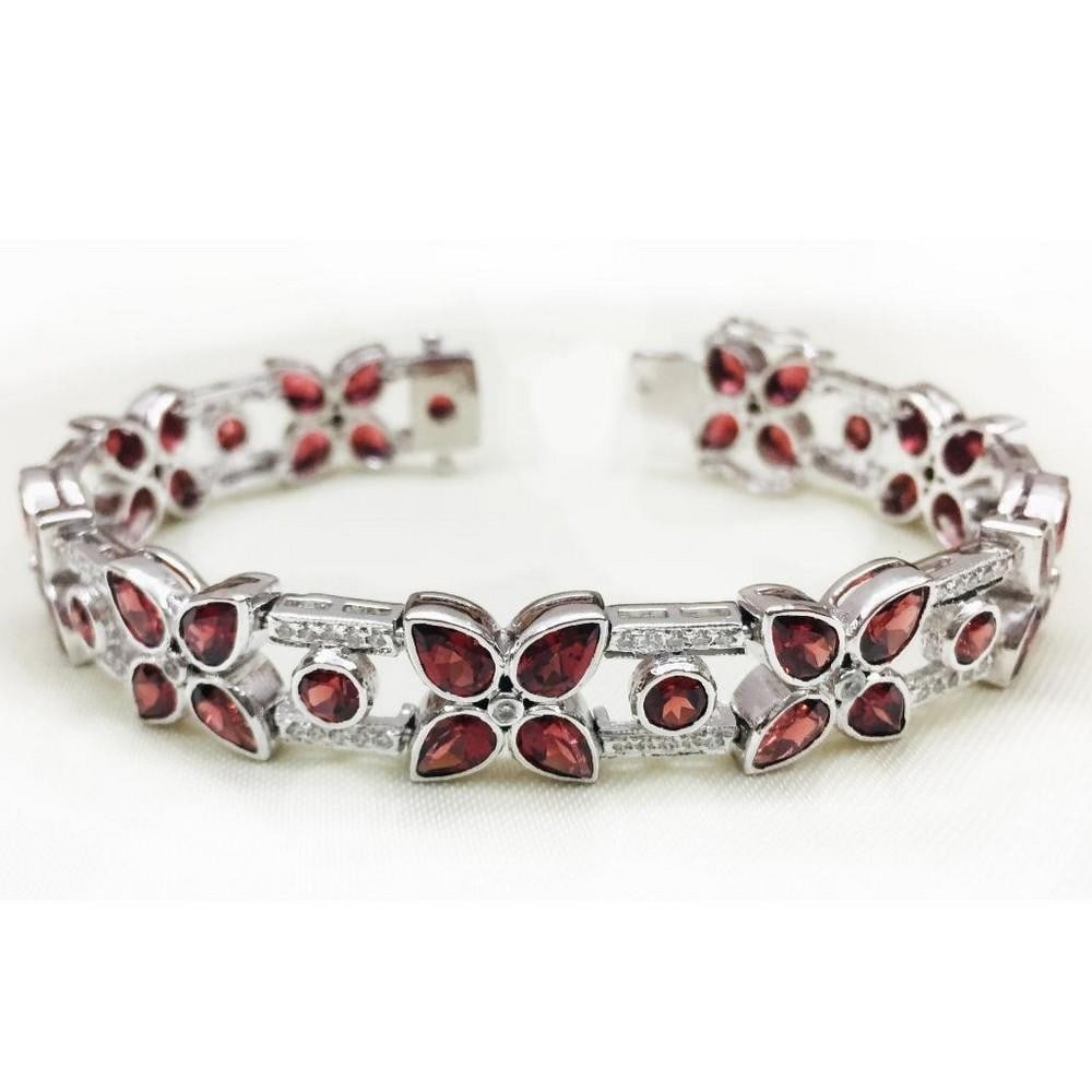 Red Garnet Flower Bracelet: Red Garnet Flower Bracelet Red garnet is a stone that brings warmth, devotion, understanding, trust, sincerity, and honesty. View Photos For For Further Details