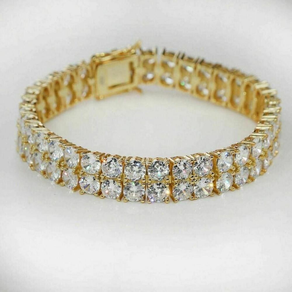 Magnificent 14kt Gold Plated 925 Sterling Silver Double Row Austrian Crystal Bracelet: Magnificent 14kt Gold Plated 925 Sterling Silver Double Row Austrian Crystal Bracelet Beautiful men's or women's two row tennis bracelet. Solid 925 Sterling Silver plated with 14kt Yellow