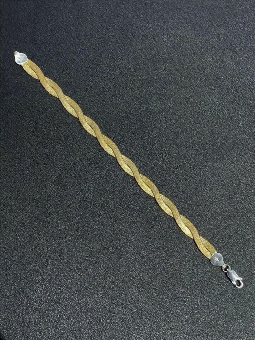 14k Gold. - Over SOLID 925 Silver - Twisted Braided "Herringbone" Bracelet: For auction is a stunning Handmade gorgeous ladies twisted herringbone bracelet. At 7mm thick and SOLID 925 Sterling Silver bonded with 14k yellow go