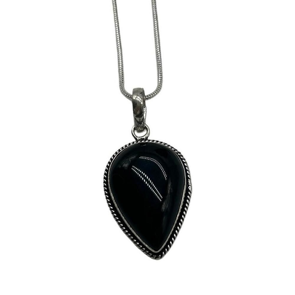 Black Onyx Necklace Pendant: Black Onyx Necklace Pendant Black onyx is commonly used for grounding, protection, and self-control, and as a shield against negative energy. This onyx gemstone pendant is 2" in size and the chai