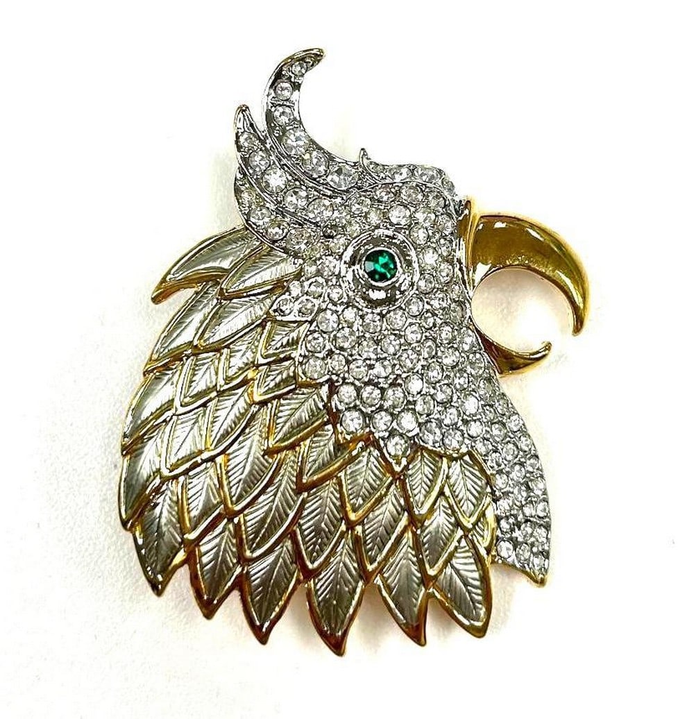 18KTGP Perky Parrot Brooch With Inset Austrian Crystals & Brilliant Green Emerald Eye: 18KTGP Perky Parrot Brooch With Inset Austrian Crystals & Brilliant Green Emerald Eye It symbolizes the everyday beauty that you possess and which you are surrounded with. The parrot symbolism is