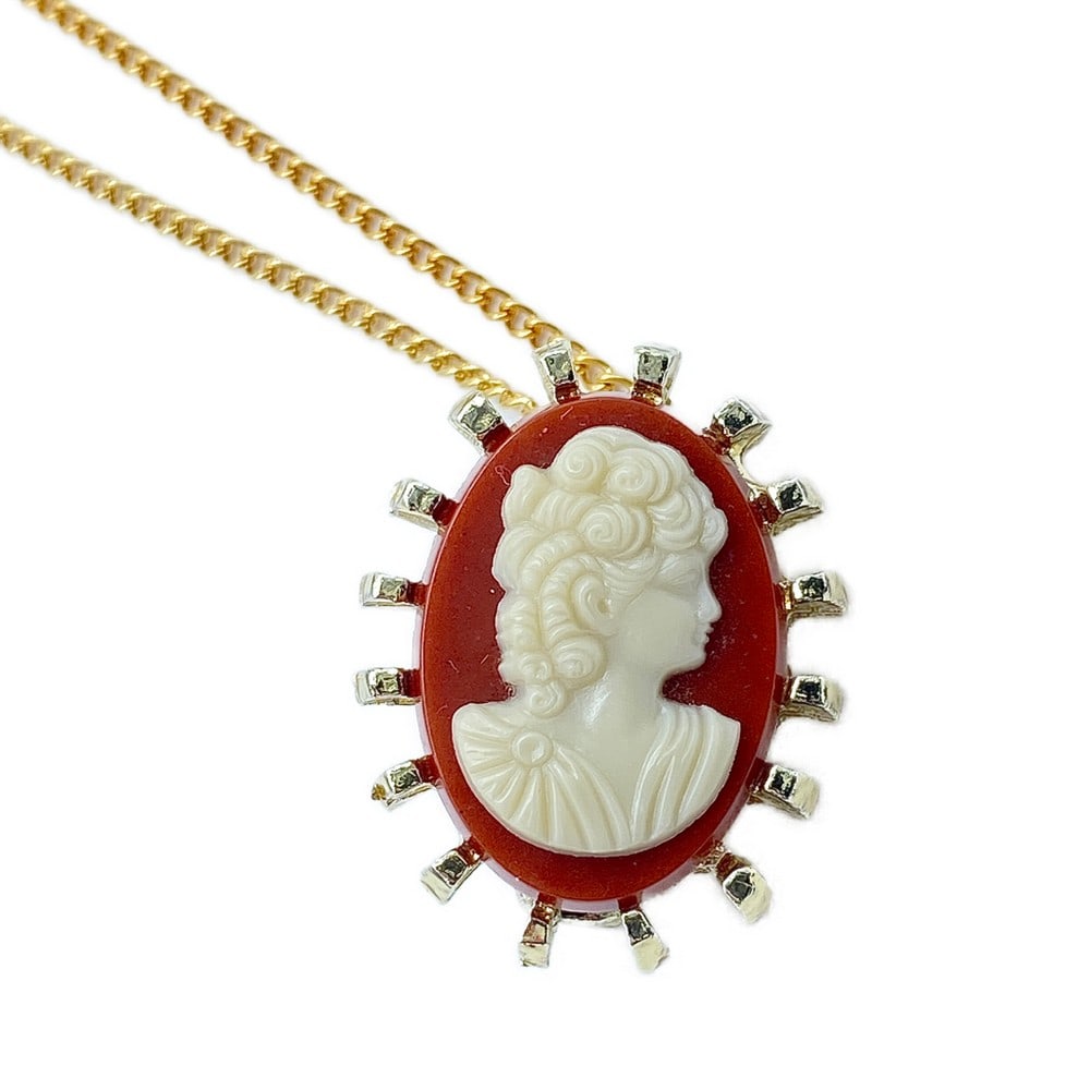 Vintage 1960s Roman Bow Tie Cameo Brooch Necklace: Vintage 1960s Roman Bow Tie Cameo Brooch Necklace Charming Vintage 1960s Roman bow tie cameo brooch. This brooch is unique as it does not attach to clothing via pin, as seen in photo there is a