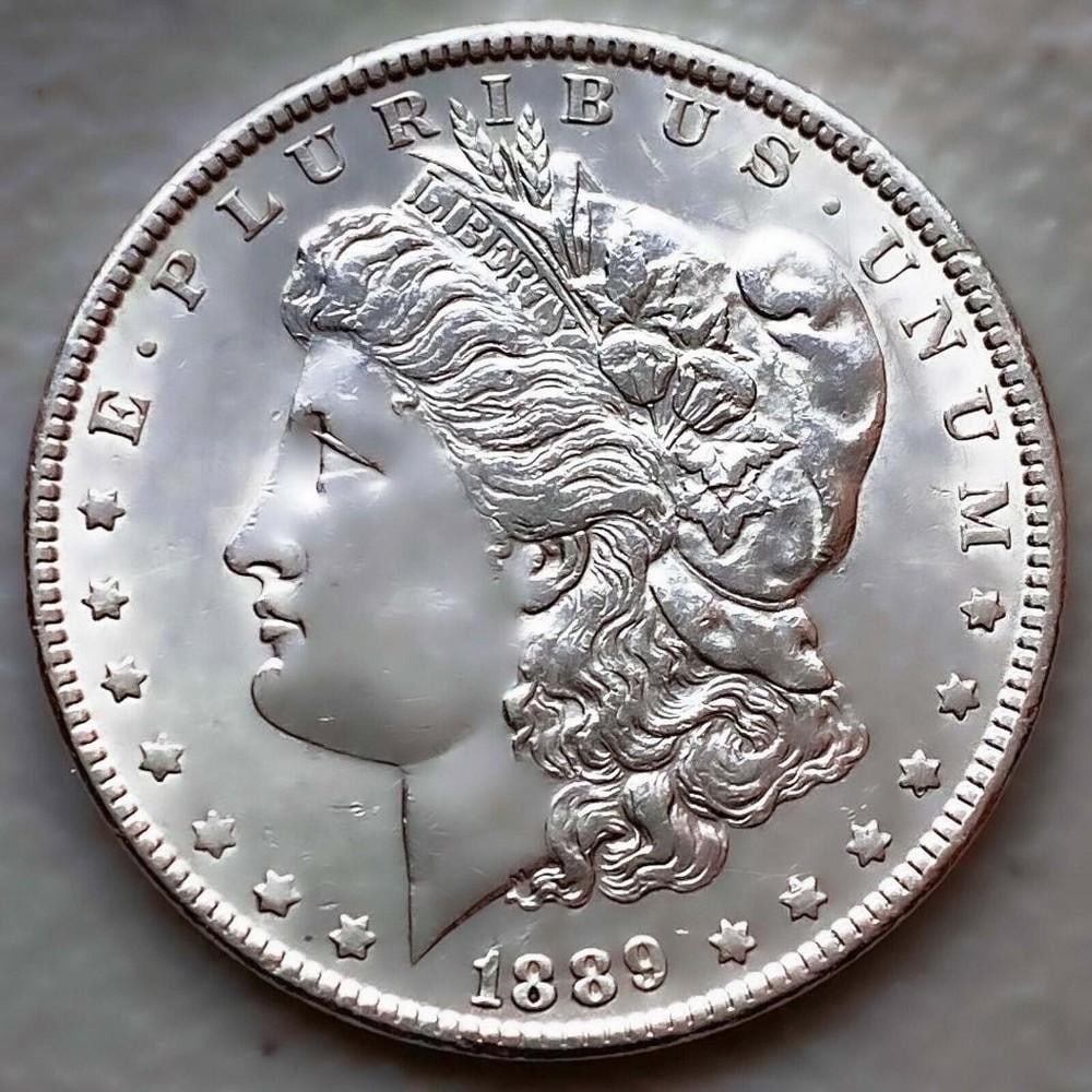 1889 AU/UNC MORGAN SILVER DOLLAR: 1889 AU/UNC MORGAN SILVER DOLLAR Certification: Uncertified Circulated/Uncirculated: Uncirculated Year: 1889 Composition: 900 Silver Mint Location: Philadelphia <