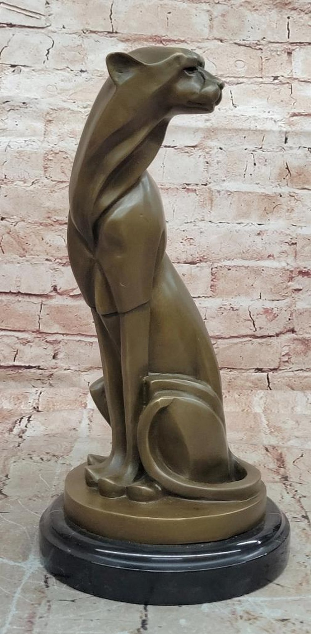 Milo Signed Abstract Cougar Bronze Sculpture on Marble Base – 12.5" x 6": Milo Signed Abstract Cougar Bronze Sculpture on Marble Base – 12.5" x 6" This hand made bronze sculpture by Milo depicts a cougar in a striking abstract modern style, capturing the feline’