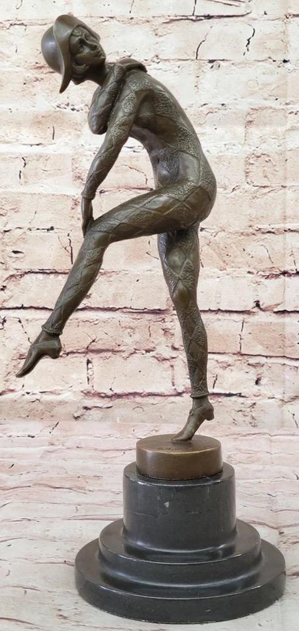 Art Nouveau Women Dancer Bronze Statue - 13" x 5": Art Nouveau Women Dancer Bronze Statue - 13" x 5" This bronze sculpture beautifully captures a woman's grace and elegance as she dances on stage. Clad in a sleek, diamond-patterned body