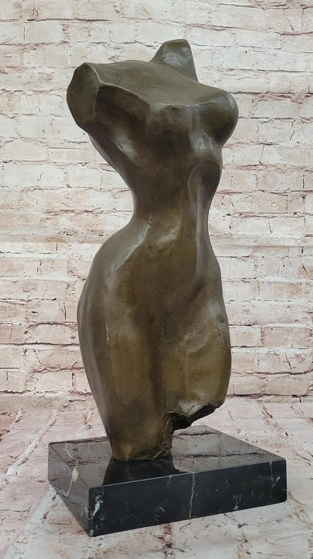 Ethereal Form Bronze Sculpture: Ethereal Form Bronze Sculpture This abstract bronze sculpture, bearing the signature of artist Mario Nick, captures the essence of the female form in minimalist elegance. Set on a sleek marble base,