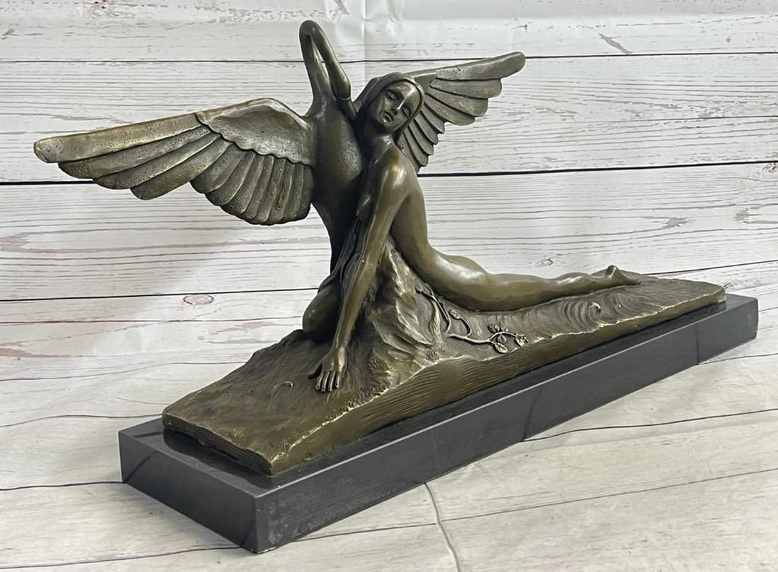 Mythological Lady & Swan Bronze Sculpture: Mythological Lady & Swan Bronze Sculpture The nude beauty seems to have glided across the water`s surface, her extended left leg acting as a counterweight, only to gently collide