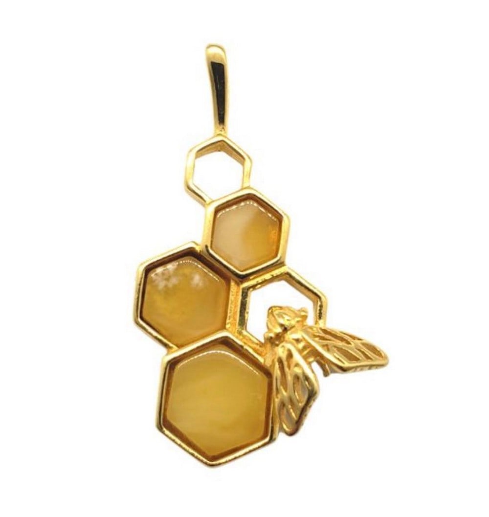 Butterscotch Amber Gold Plated Honeycomb Bee Pendant: Butterscotch Amber Gold Plated Honeycomb Bee Pendant This pendant features stunning butterscotch coloured Amber set into a gold plated 925 sterling silver honeycomb with a little bee. View Photos Fo
