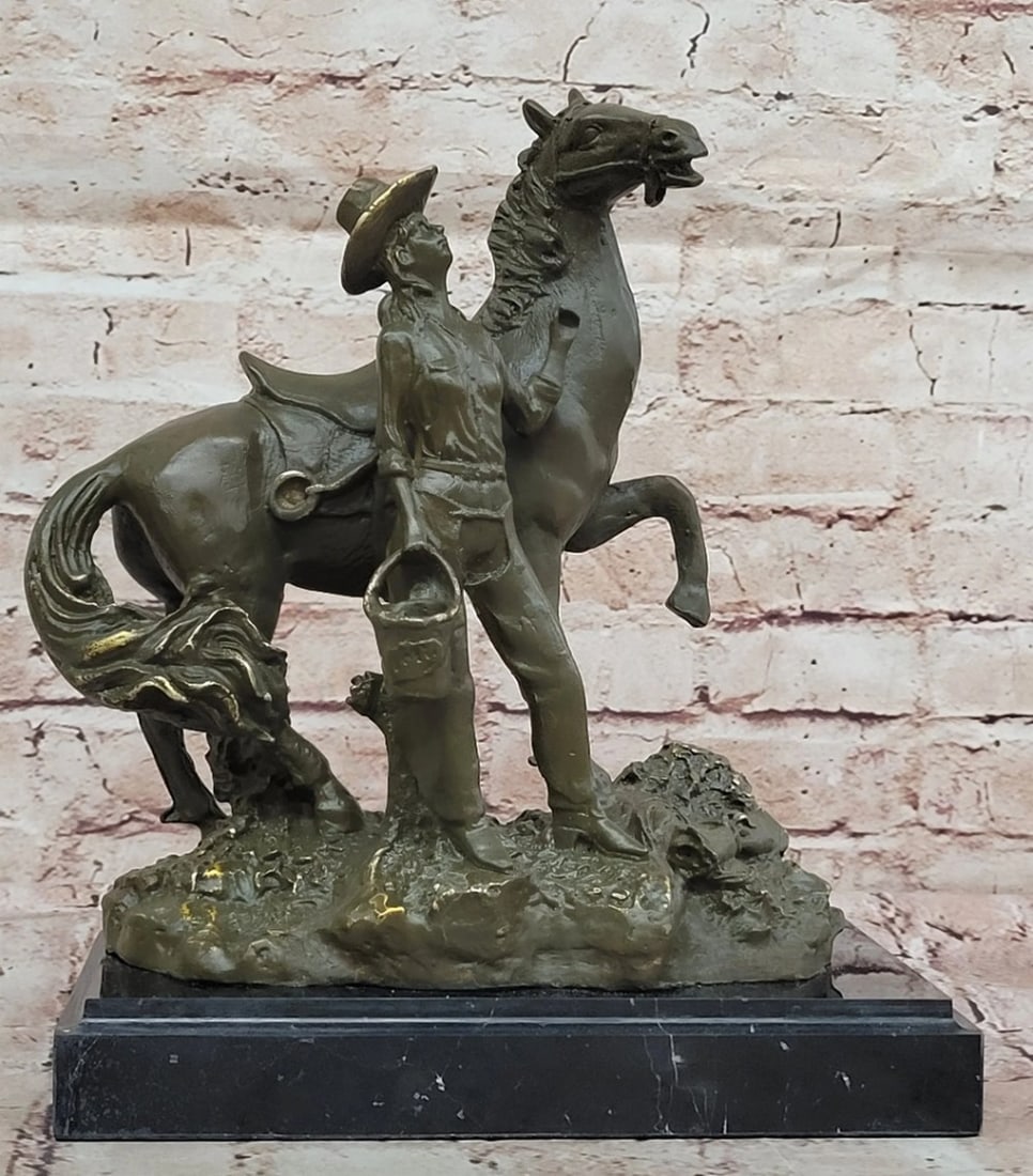 Western Horse Tamer Original Bronze Statue - 11.5" x 9.5": Western Horse Tamer Original Bronze Statue - 11.5" x 9.5" This evocative bronze sculpture captures a Western cowgirl standing beside her trusted horse, embodying the strength, grace, and resi