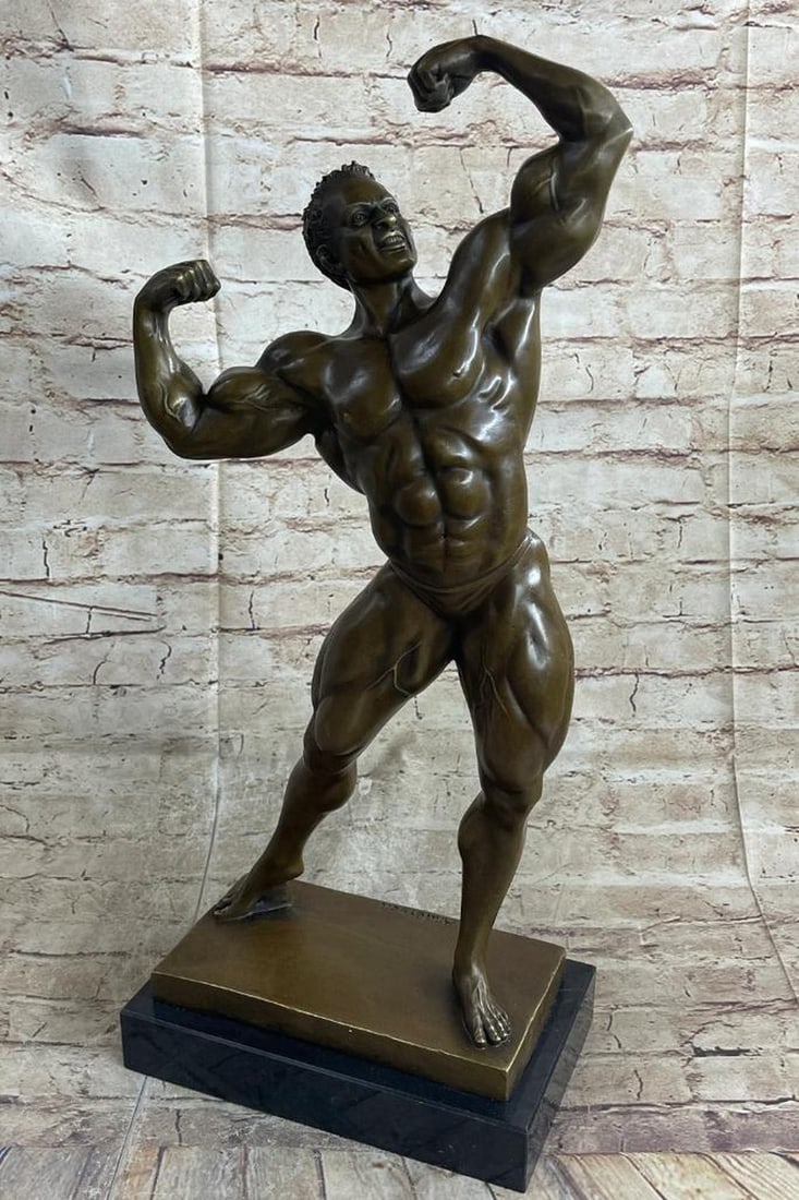 Iron Man Inspired Bronze Sculpture by Anderson - 21" x 10": Iron Man Inspired Bronze Sculpture by Anderson - 21" x 10" This striking bronze statue captures Iron Man, a symbol of strength and determination, confidently placing his hands on his hips. Eve