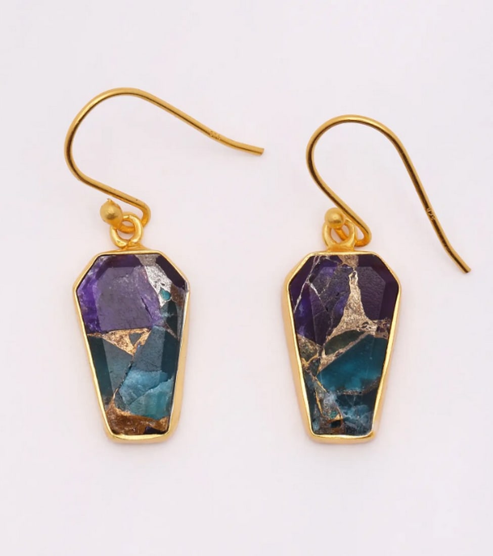 Mystic Amazonite & Amethyst Drops: Mystic Amazonite & Amethyst Drops These Amazonite & Purple Amethyst hook earrings showcase a captivating blend of vibrant teal and deep purple hues. Set in gold-plated sterling silver, their u