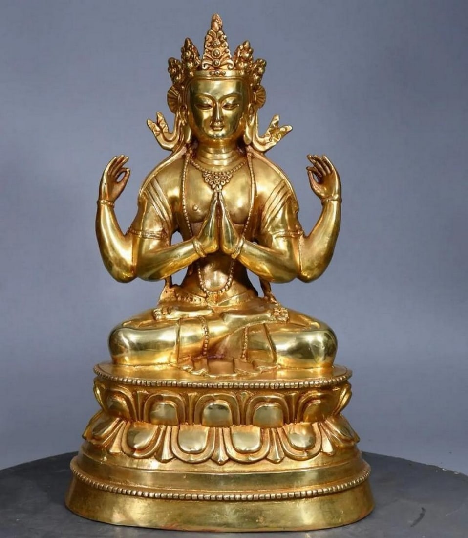 Gilded Copper Four-Armed Tara Buddha Statue: Gilded Copper Four-Armed Tara Buddha Statue This exquisite statue of the Four-Armed Tara embodies compassion, wisdom, and protection. Crafted from rare pure copper with a rich gilt finish, it showcase