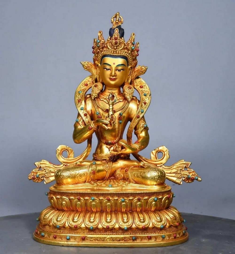 Gilded Copper Vajrasattva Buddha Statue: Gilded Copper Vajrasattva Buddha Statue This exquisite statue of Vajrasattva, the Buddha of purification, is handcrafted from rare pure copper and beautifully gilded. Known for his embodiment of wisdo