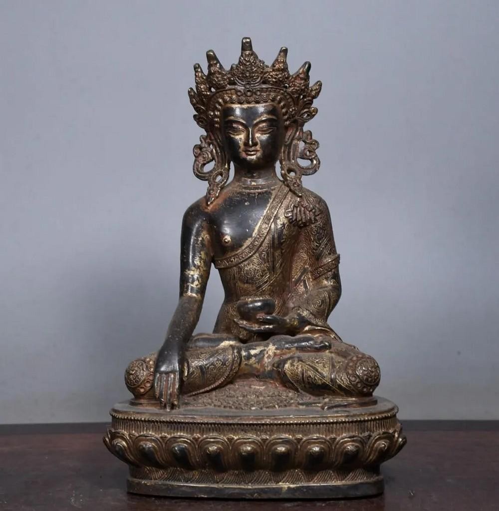 Antique Chinese Copper Gilt Five-Sided Buddha Statue: Antique Chinese Copper Gilt Five-Sided Buddha Statue A rare antique five-sided Buddha statue, handcrafted from pure copper with a delicate gilt finish. This remarkable piece represents the five wisdo