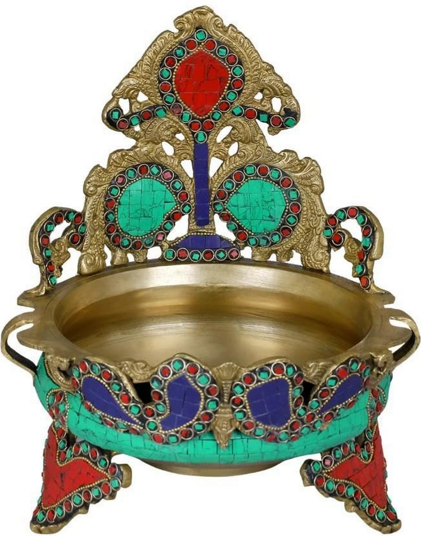 Beautifully Crafted Brass Urli with Traditional Inlay Work: Beautifully Crafted Brass Urli with Traditional Inlay Work This brass Urli with traditional inlay work of blue, green, and red colored stones is a rainbow amongst the vast variety of plain brasswork.