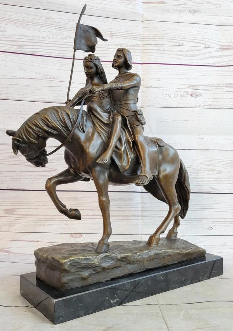 Bronze Figure of a Couple on Horseback - 18.5" x 14": Bronze Figure of a Couple on Horseback - 18.5" x 14" This enchanting bronze figure captures the essence of romance and adventure, depicting a man and woman gracefully riding horseback while c