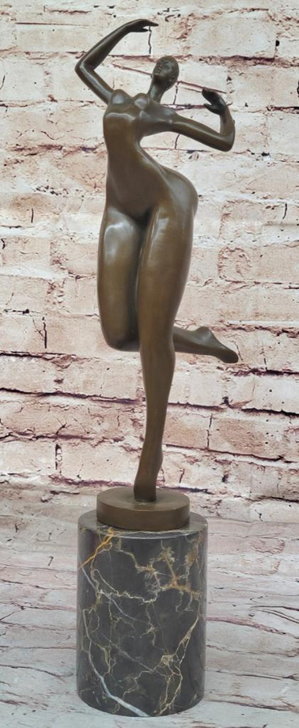 Captivating Bronze Sculpture in Abstract Embrace - 16" x 5": Captivating Bronze Sculpture in Abstract Embrace - 16" x 5" Behold the captivating beauty of this stunning bronze sculpture, featuring a graceful figure in an abstract embrace. Portrayed knee
