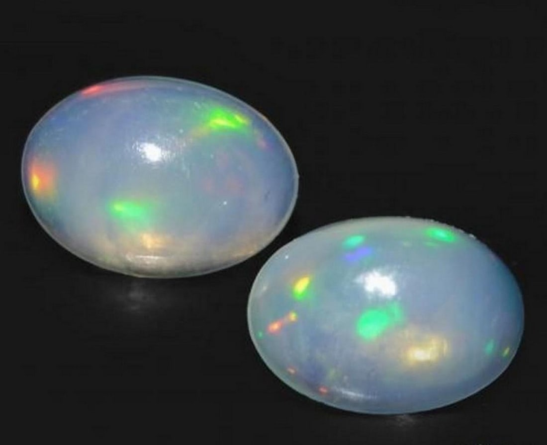 0.89ct Bluish White Oval Opal Cabochon Gemstones (1 of 2)