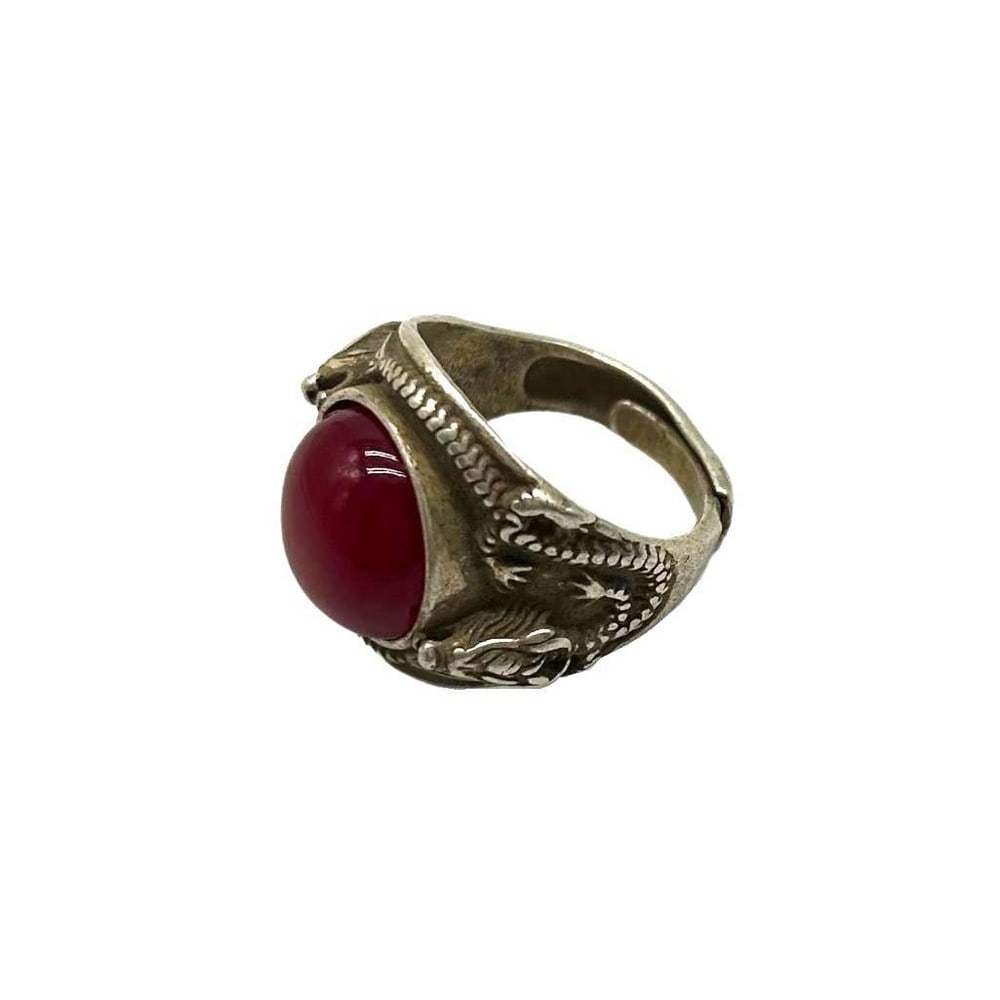 Double Dragon Red Gem Ring: Double Dragon Red Gem Ring This ring measures 2.5cm x 2cm. The dragon symbolizes power, change, and spirituality, and it also symbolizes good luck, fortune, and prosperity. In some cultures, the drag