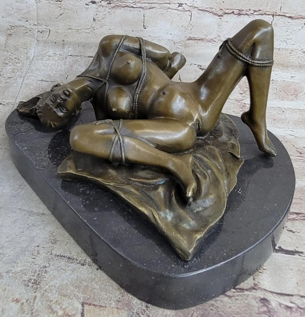 Provocative Bronze Sculpture of Intimate Lovers by Mavchi - 6" x 12": Provocative Bronze Sculpture of Intimate Lovers by Mavchi - 6" x 12" This provocative bronze sculpture captures an intimate moment between lovers engaged in a sensuous and seductive game. The