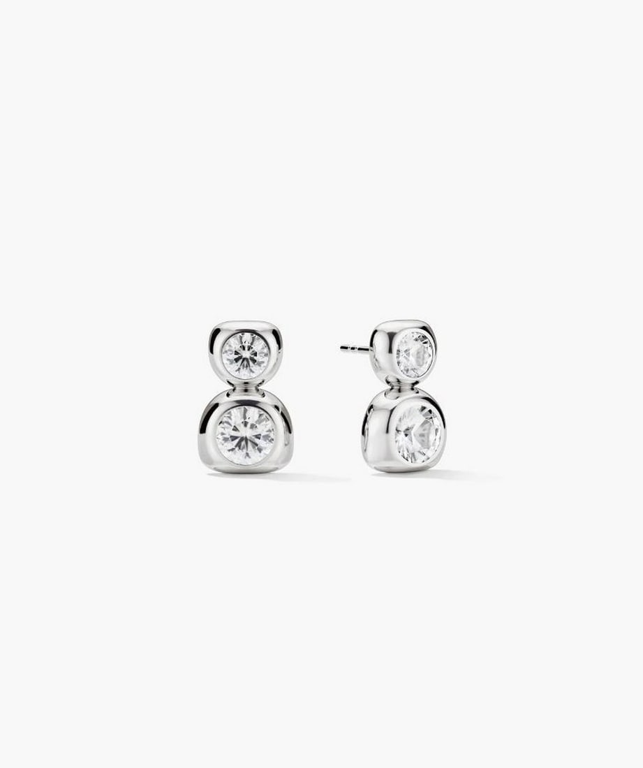 Sterling Silver Lab-Grown Sapphire Drop Earrings: Sterling Silver Lab-Grown Sapphire Drop Earrings A pair of drop earrings featuring lab-grown sapphires in a double-stone design. The sapphires are produced through an eco-friendly growth process,
